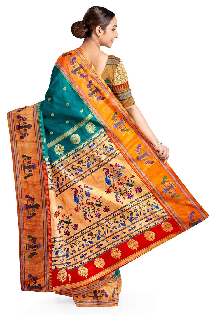 Paithani pure silk saree in green with with round buttis with meena work.