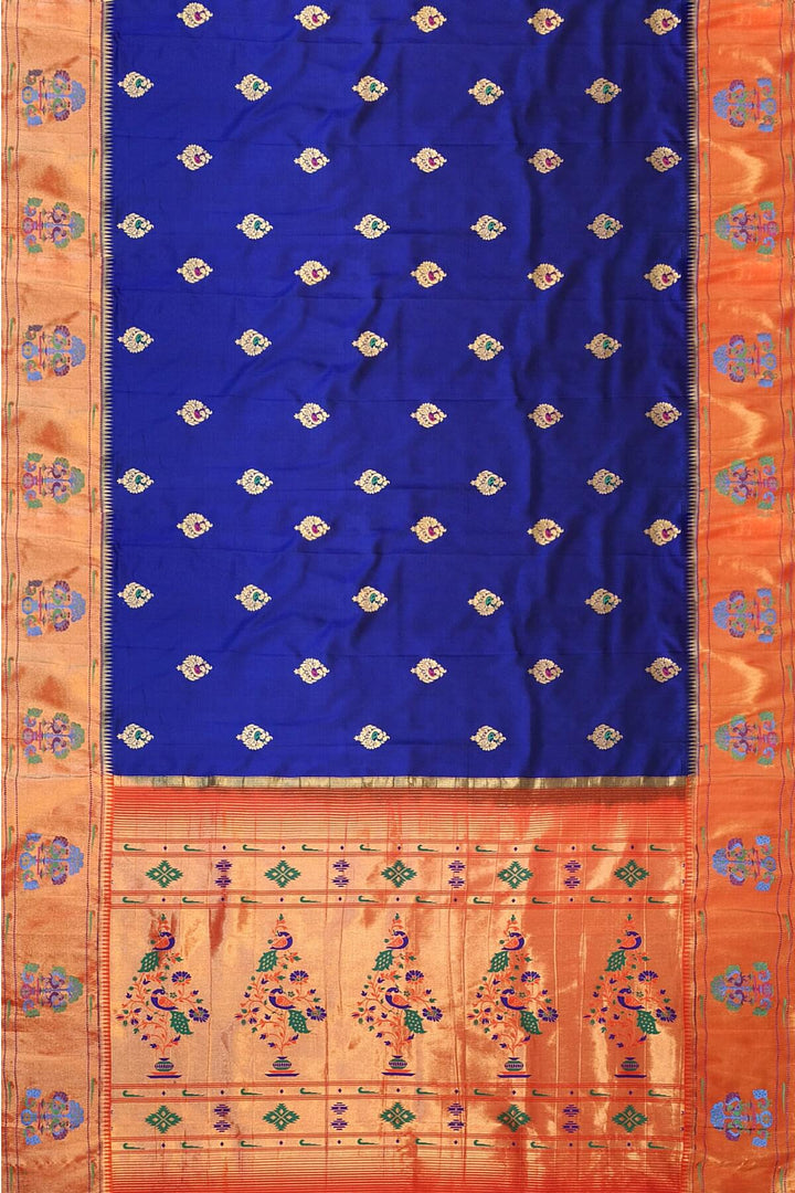 Paithani pure silk saree in violet with peacock motifs on the body.