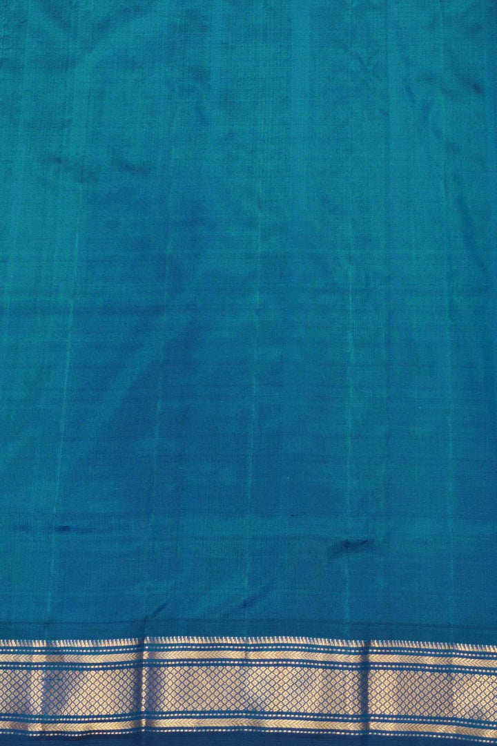 Handwoven Paithani pure silk saree in peacock blue with mango motifs