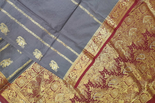 Kora silk saree in grey with  floral motifs in gold