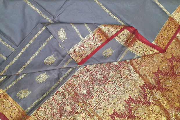 Kora silk saree in grey with  floral motifs in gold