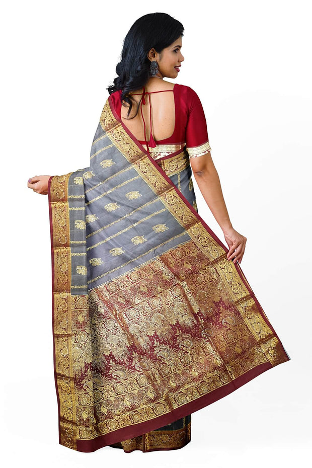 Kora silk saree in grey with  floral motifs in gold