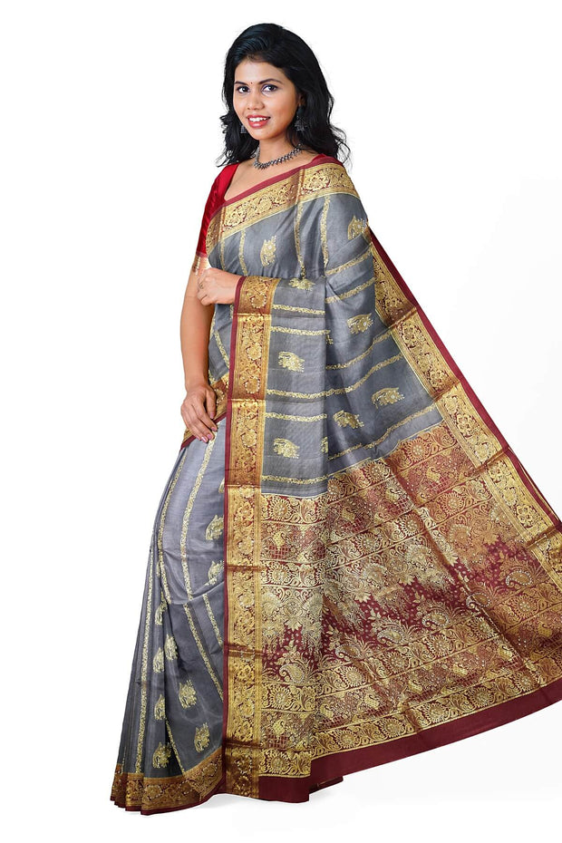 Kora silk saree in grey with  floral motifs in gold