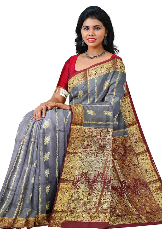 Kora silk saree in grey with  floral motifs in gold