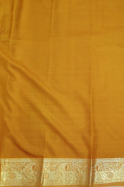 Kora silk saree in green with  floral motifs in gold