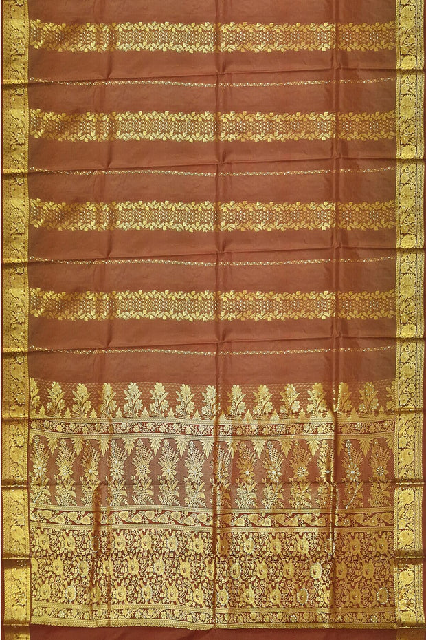 Kora silk saree in coffee brown with  floral motifs in gold