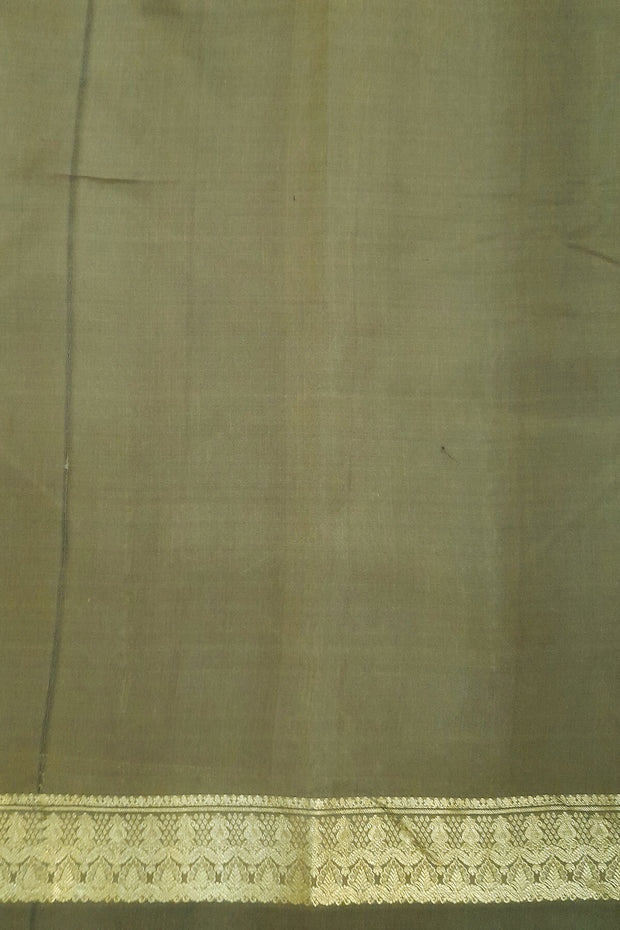 Kora silk saree in sage green with small motifs all over the body