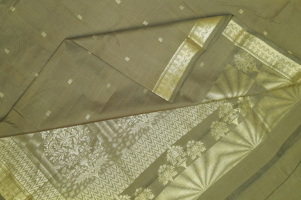 Kora silk saree in sage green with small motifs all over the body