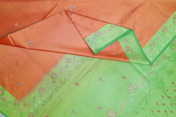 Pure silk saree in peach with embroidery work  all over the body & pallu
