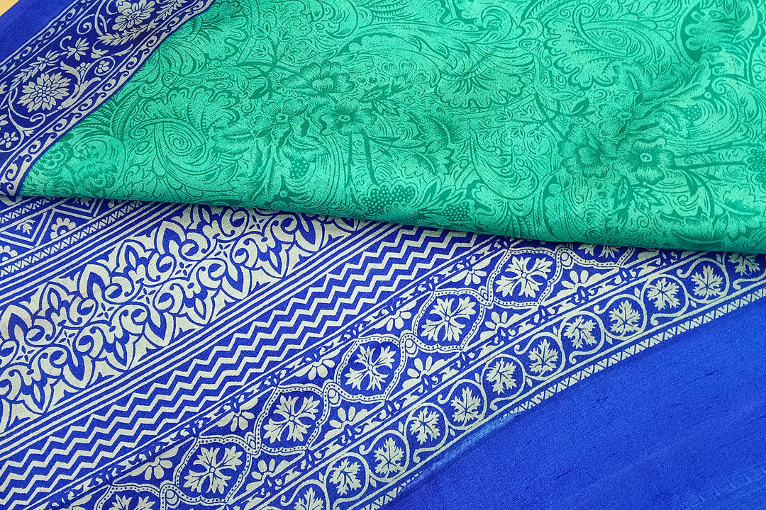 Printed pure silk saree in teal blue