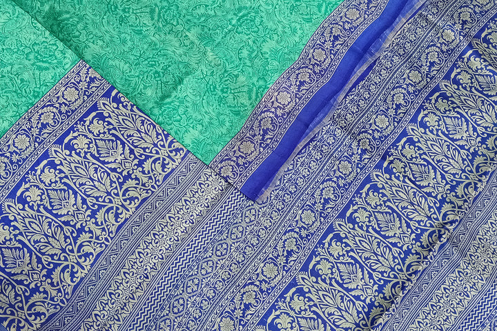 Printed pure silk saree in teal blue