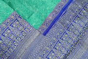 Printed pure silk saree in teal blue