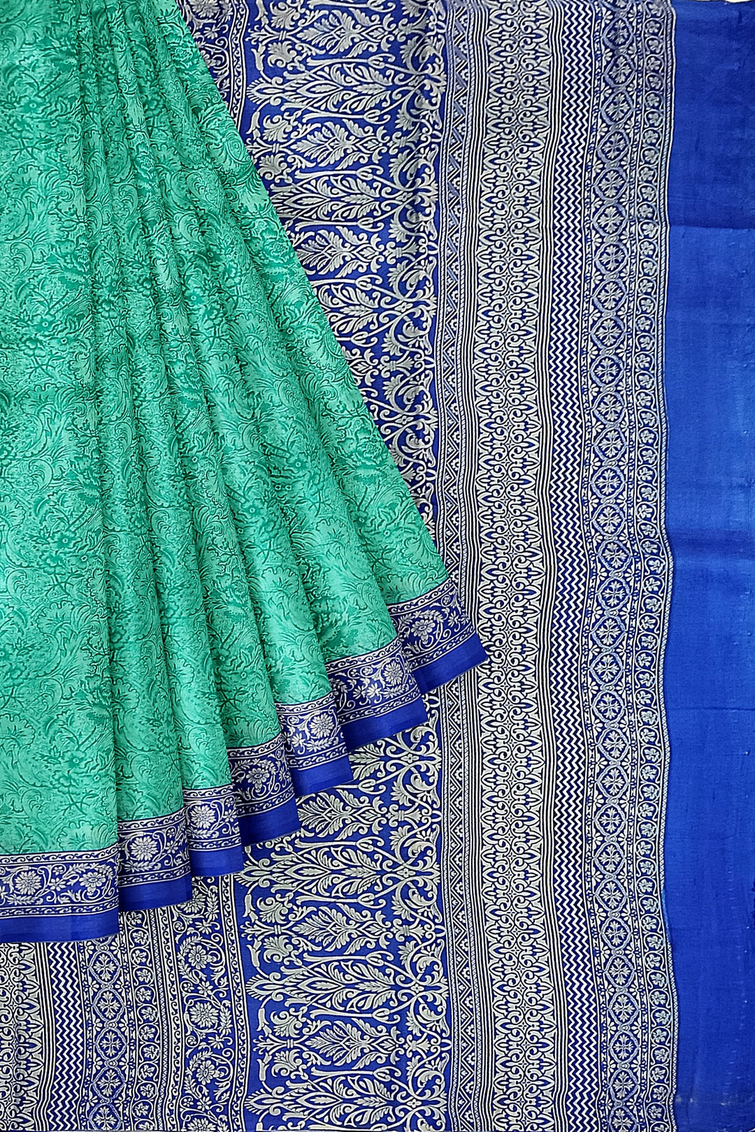 Printed pure silk saree in teal blue