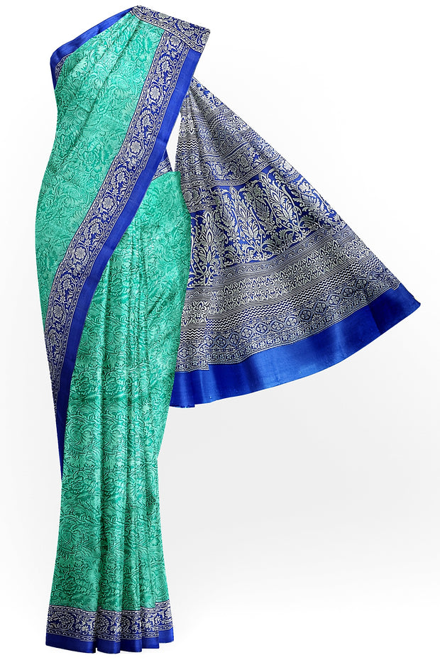 Printed pure silk saree in teal blue