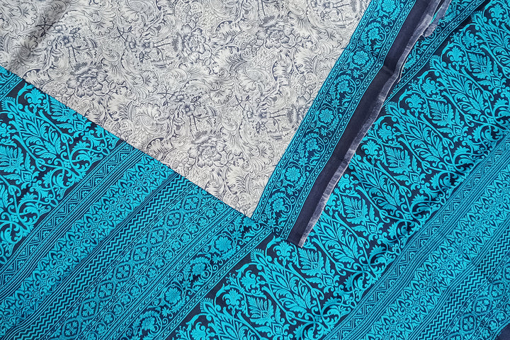Printed pure silk saree in bluish grey in floral pattern