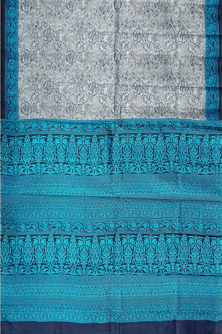 Printed pure silk saree in bluish grey in floral pattern