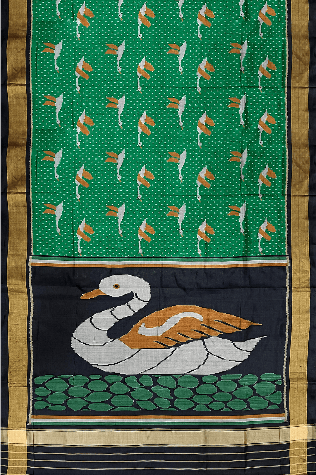 Handwoven Patola pure silk saree in green  with bird motifs