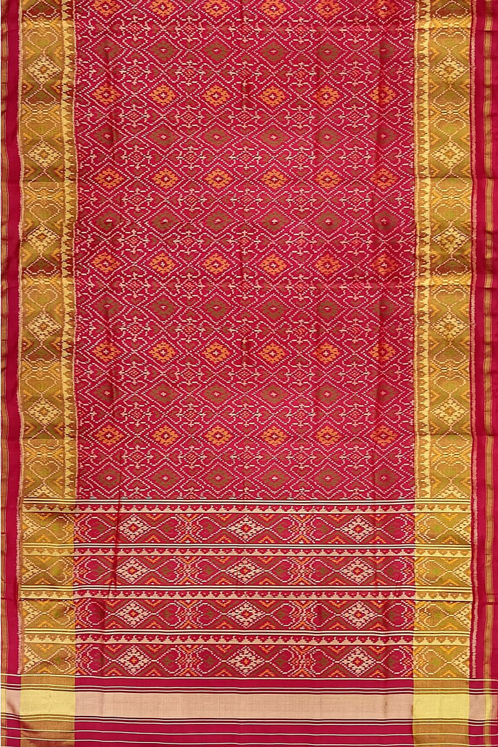 Handwoven Patola pure silk saree  in red in pan bhat pattern.