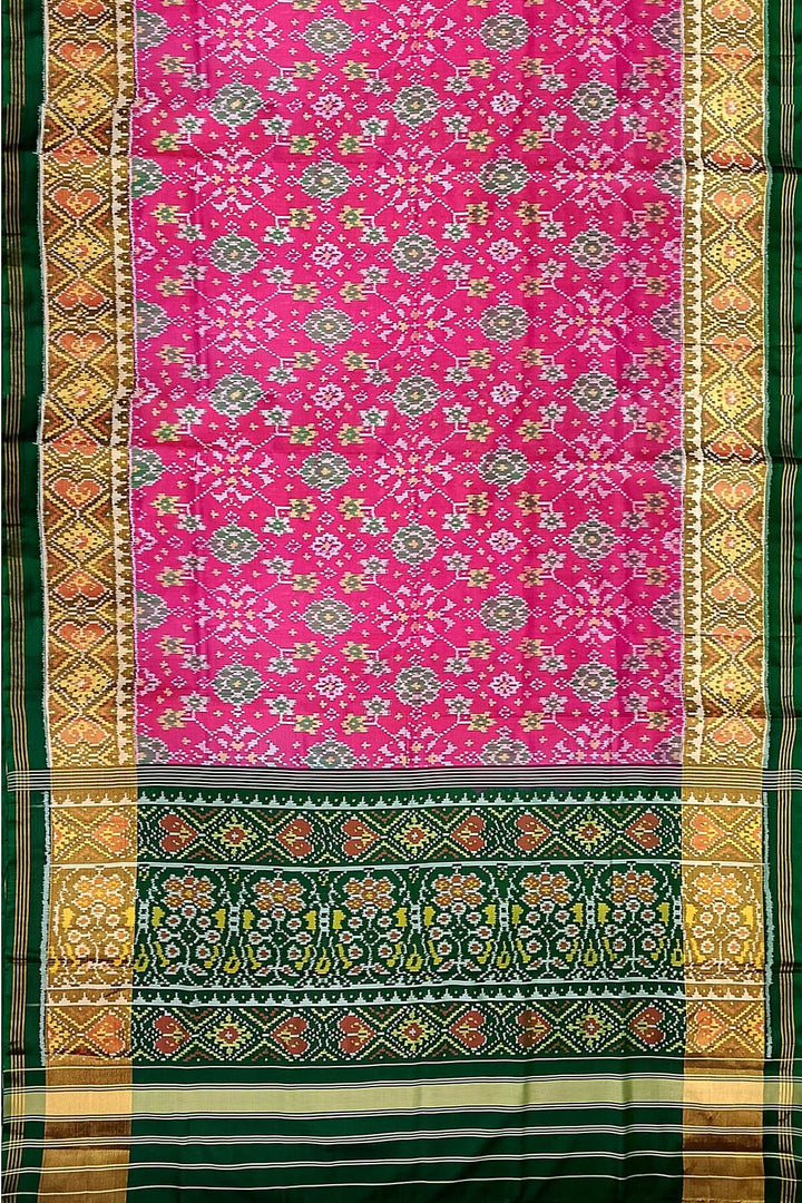 Handwoven Patola pure silk saree in pink in navratan pattern