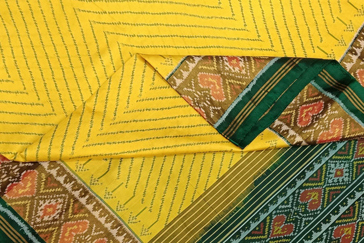 Handwoven Patola pure silk saree in yellow in zig zag  pattern