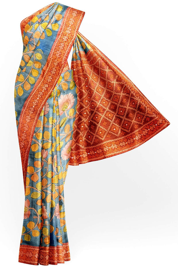 Hand painted kalamkari on  tussar silk saree in blue with kutch embroidery