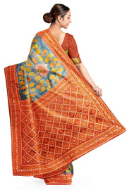 Hand painted kalamkari on  tussar silk saree in blue with kutch embroidery