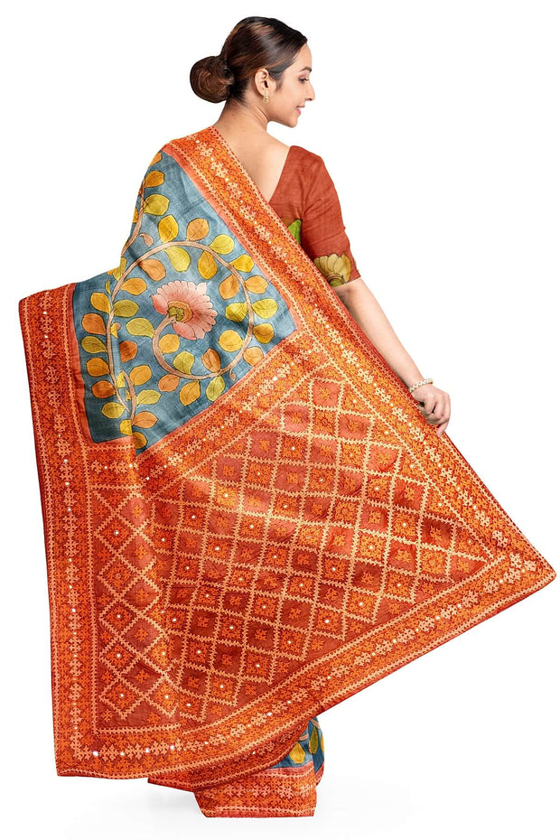 Hand painted kalamkari on  tussar silk saree in blue with kutch embroidery