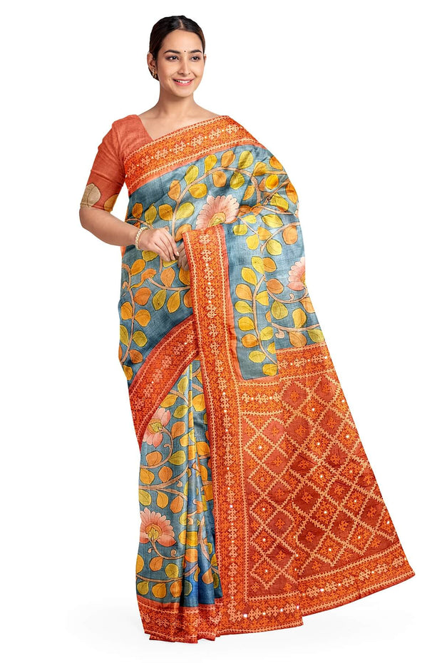 Hand painted kalamkari on  tussar silk saree in blue with kutch embroidery