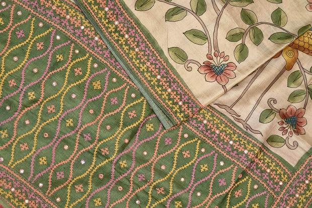Hand painted kalamkari on  tussar silk saree in off white  with kutch embroidery