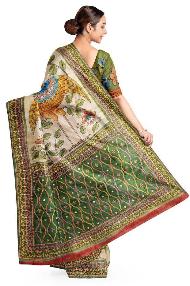 Hand painted kalamkari on  tussar silk saree in off white  with kutch embroidery