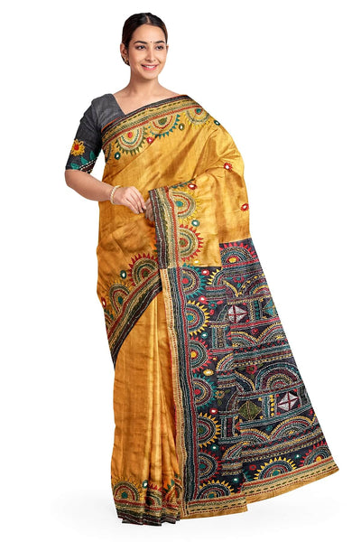 Lambani hand embroidery  on Tussar pure silk saree in mustard
