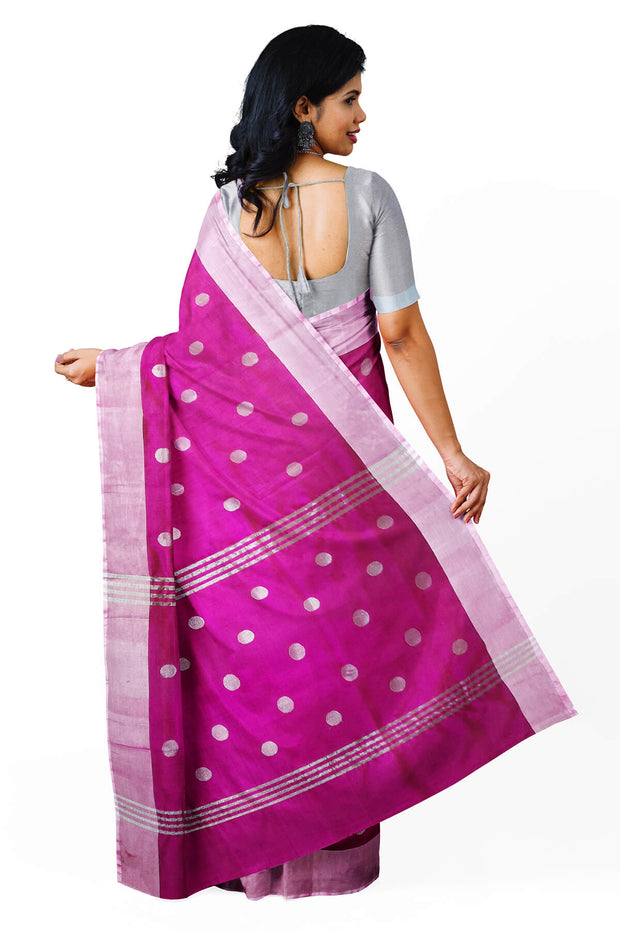Handwoven Uppada pure silk saree in dark magenta  with motifs, borders & blouse in silver