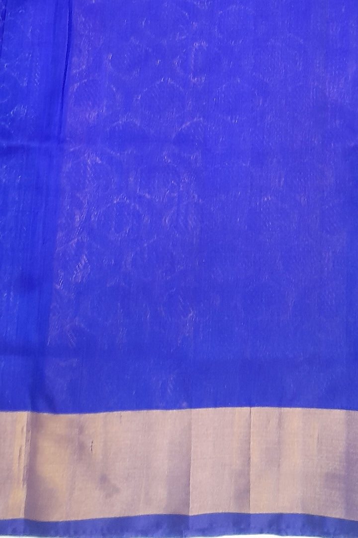 Handwoven Uppada pure silk saree in torquoise blue with floral motifs in gold & silver.