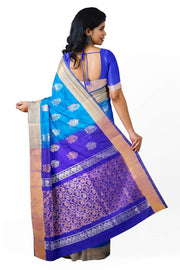 Handwoven Uppada pure silk saree in torquoise blue with floral motifs in gold & silver.