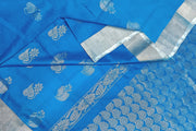 Handwoven Uppada pure silk saree in copper sulphate blue with floral motifs in silver.