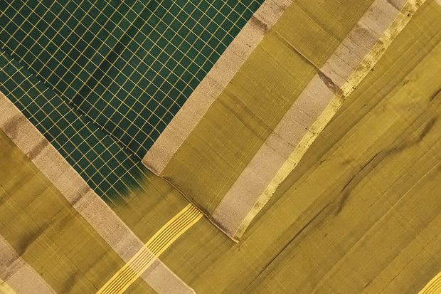 Handloom Uppada pure silk saree in  checks in bottle green and a contrast pallu in mustard