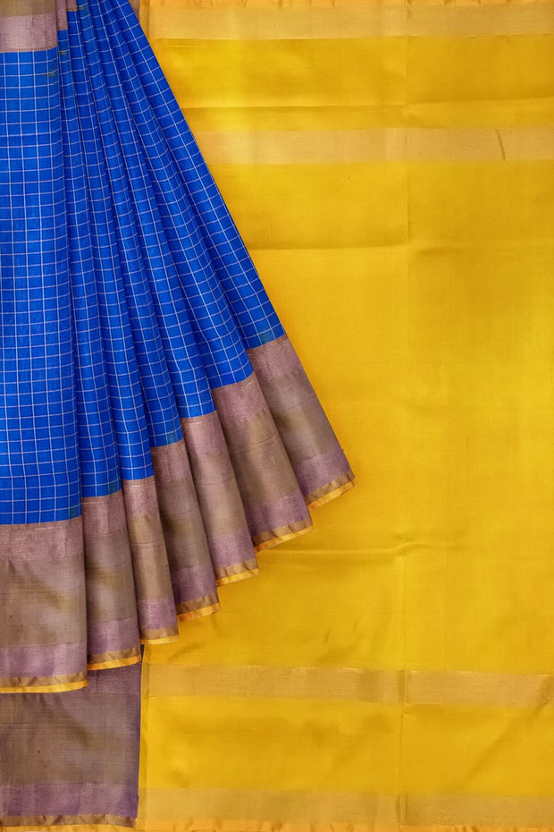 Handloom Uppada pure silk saree in  checks in blue and a contrast pallu in yellow