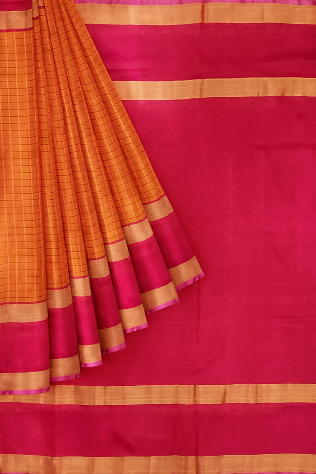 Handloom Uppada pure silk saree in  checks in mustard and a contrast pallu in pink