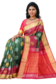 Handwoven Uppada pure silk saree in bottle green with gold & silver motifs .