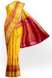 Handwoven Uppada pure silk saree in yellow with gold & silver motifs .