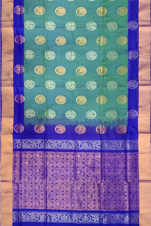 Handwoven Uppada pure silk saree in double shaded  green with gold & silver motifs .