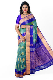 Handwoven Uppada pure silk saree in double shaded  green with gold & silver motifs .