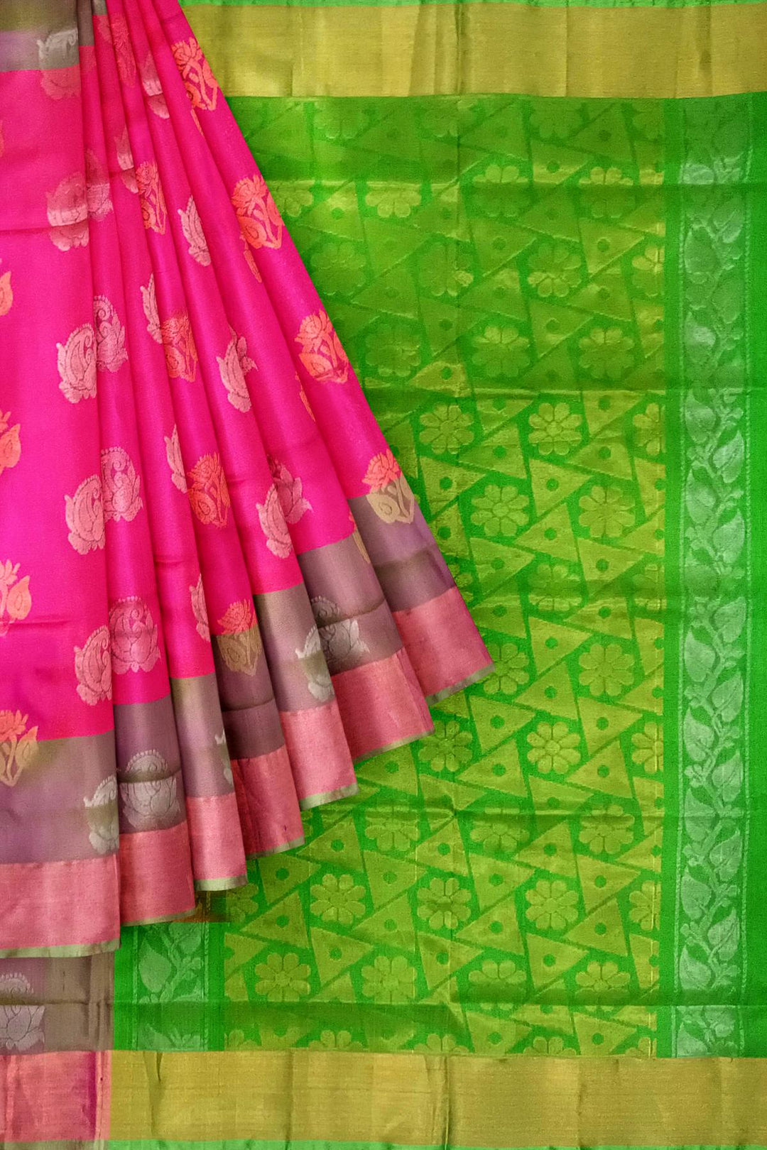 Handwoven Uppada pure silk saree in reddish pink with gold & silver motifs .