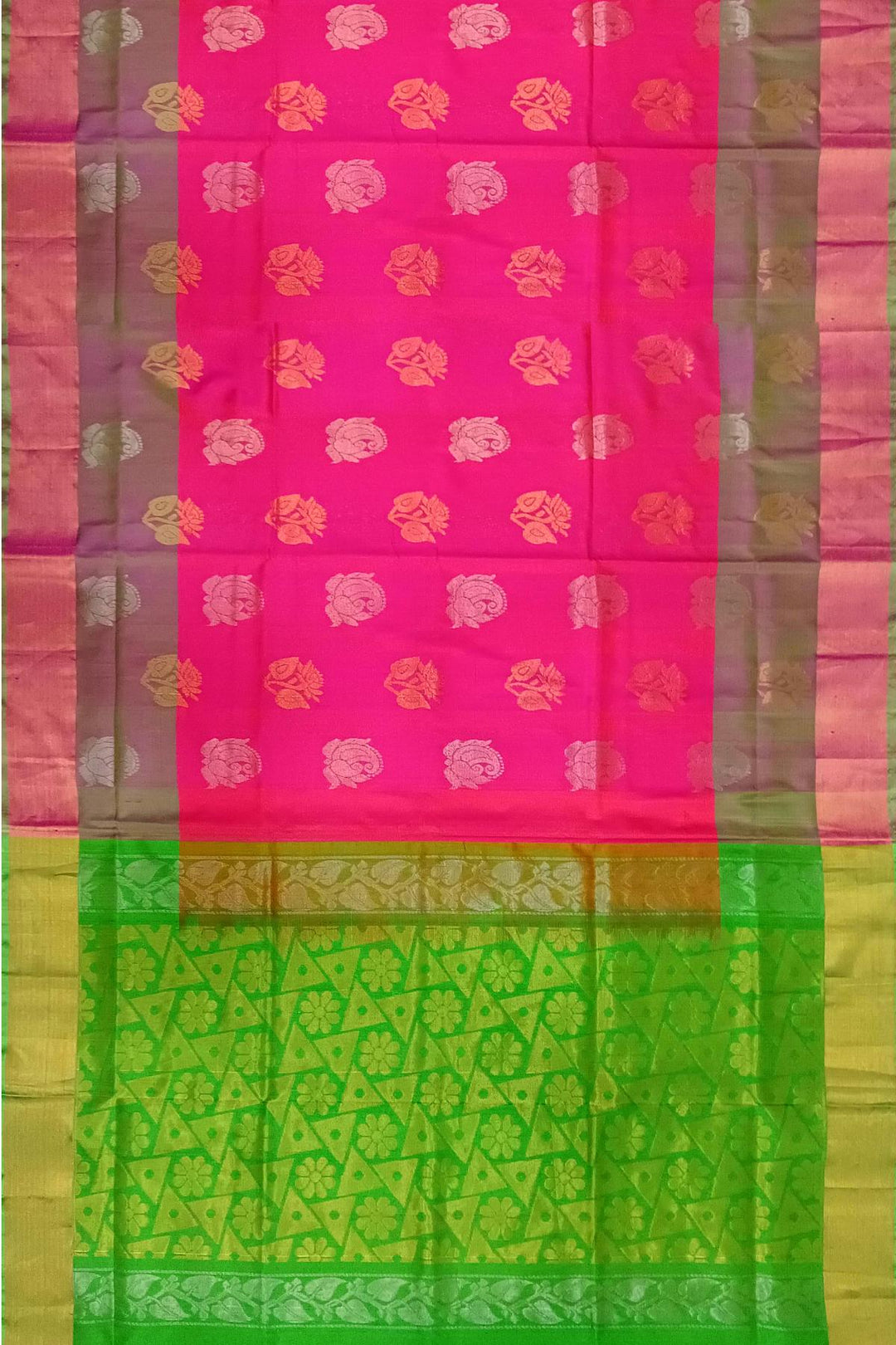 Handwoven Uppada pure silk saree in reddish pink with gold & silver motifs .