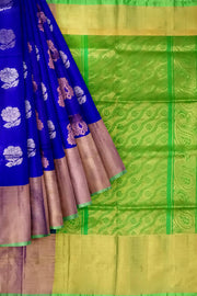 Handwoven Uppada pure silk saree in  violet with gold & silver motifs .