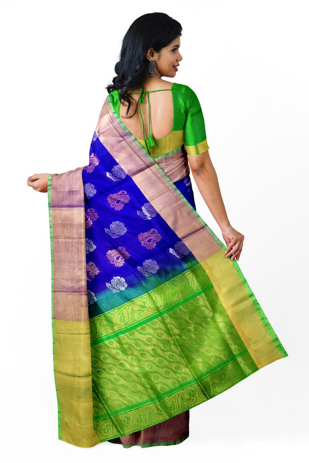 Handwoven Uppada pure silk saree in  violet with gold & silver motifs .