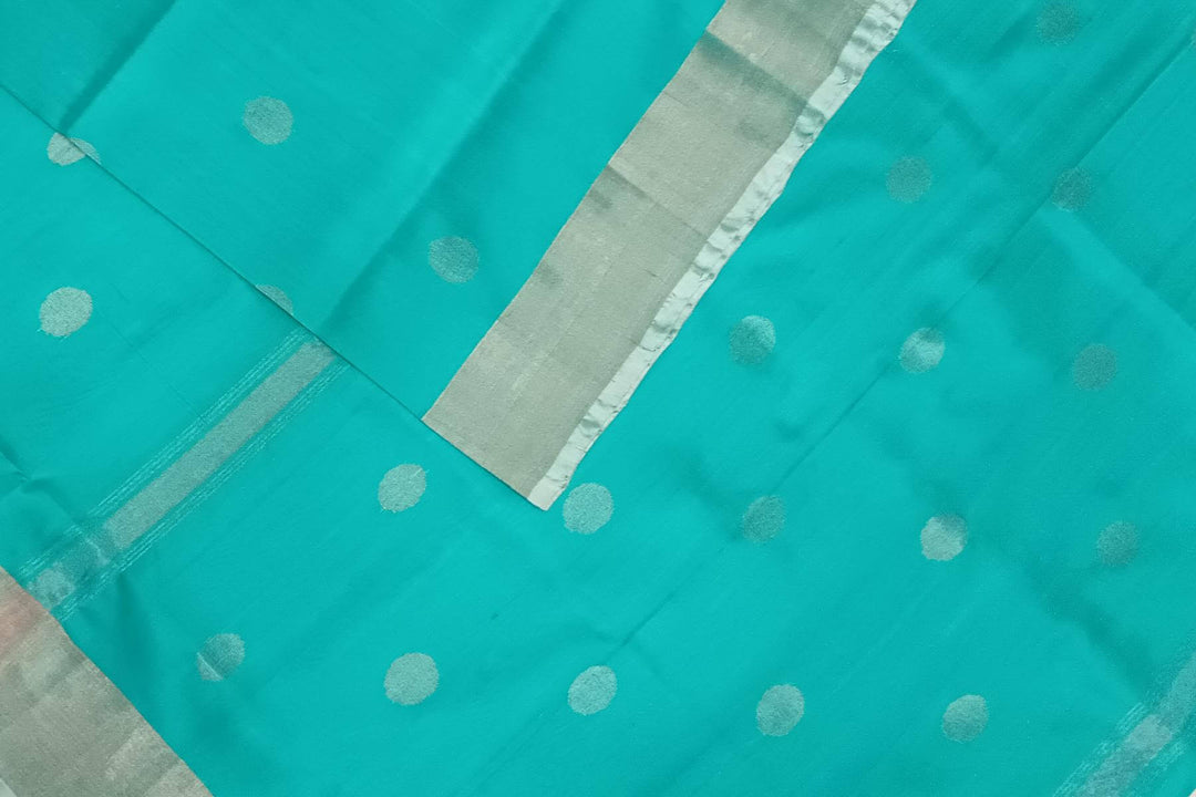 Handwoven Uppada pure silk saree in teal blue with silver motifs