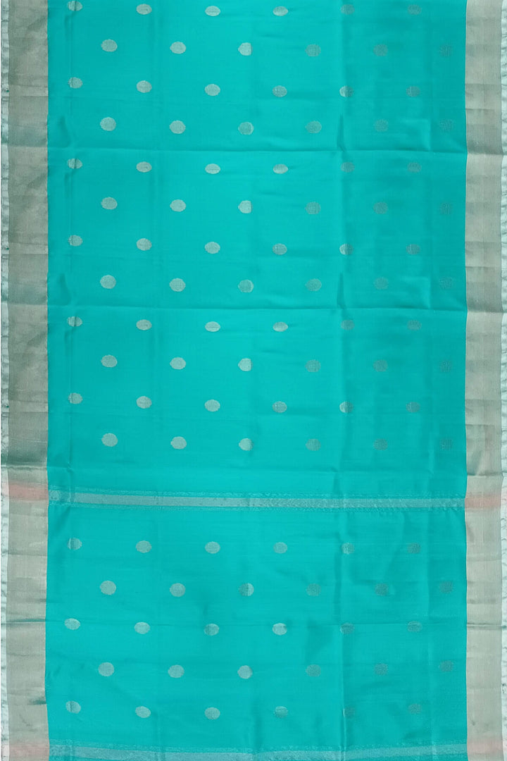 Handwoven Uppada pure silk saree in teal blue with silver motifs