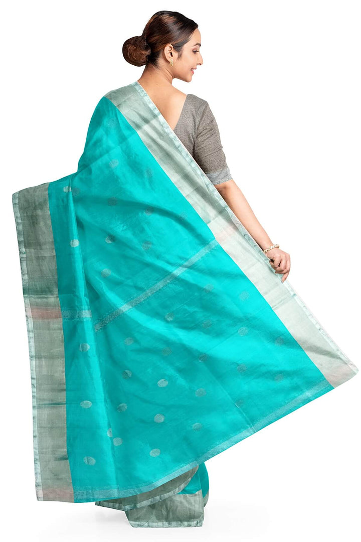 Handwoven Uppada pure silk saree in teal blue with silver motifs