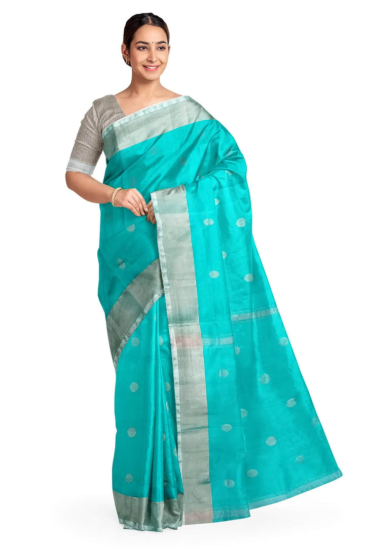Handwoven Uppada pure silk saree in teal blue with silver motifs